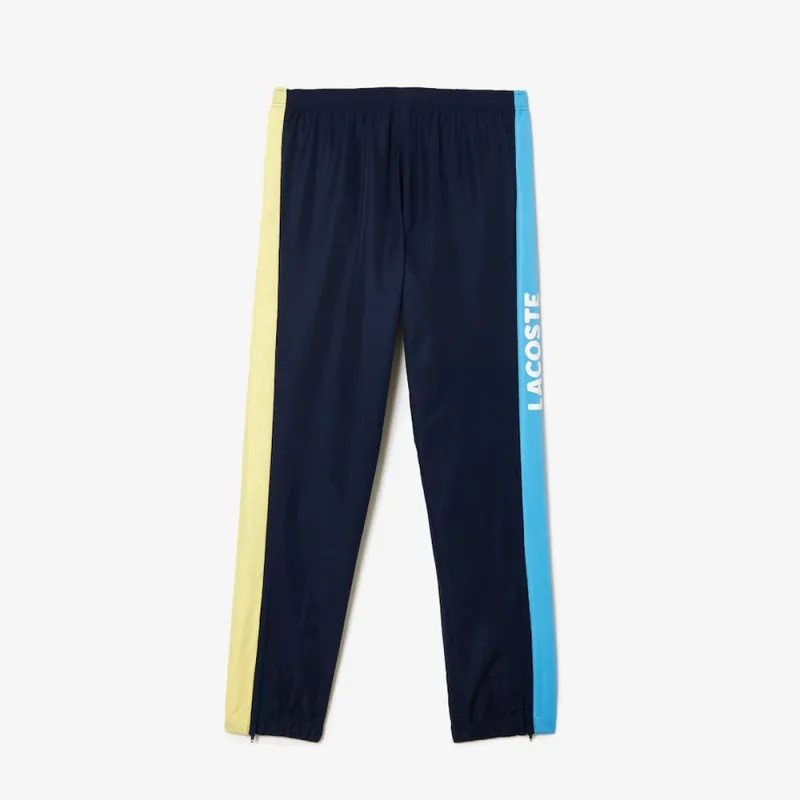 PANTALON DE SURVÊTEMENT LACOSTE TENNIS SPORTSUIT LÉGER BLEU MARINE