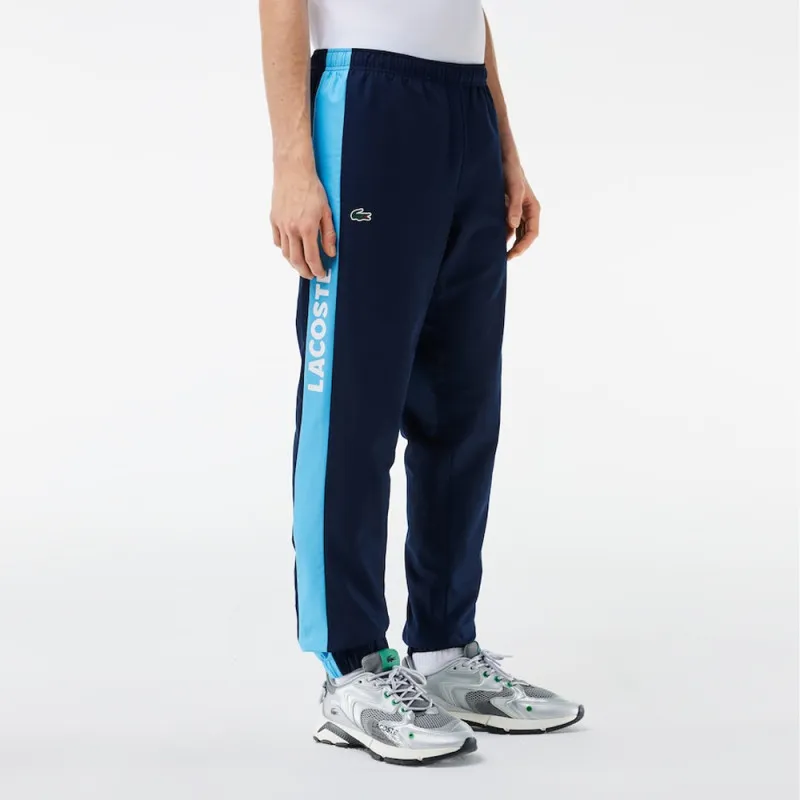 PANTALON DE SURVÊTEMENT LACOSTE TENNIS SPORTSUIT LÉGER BLEU MARINE