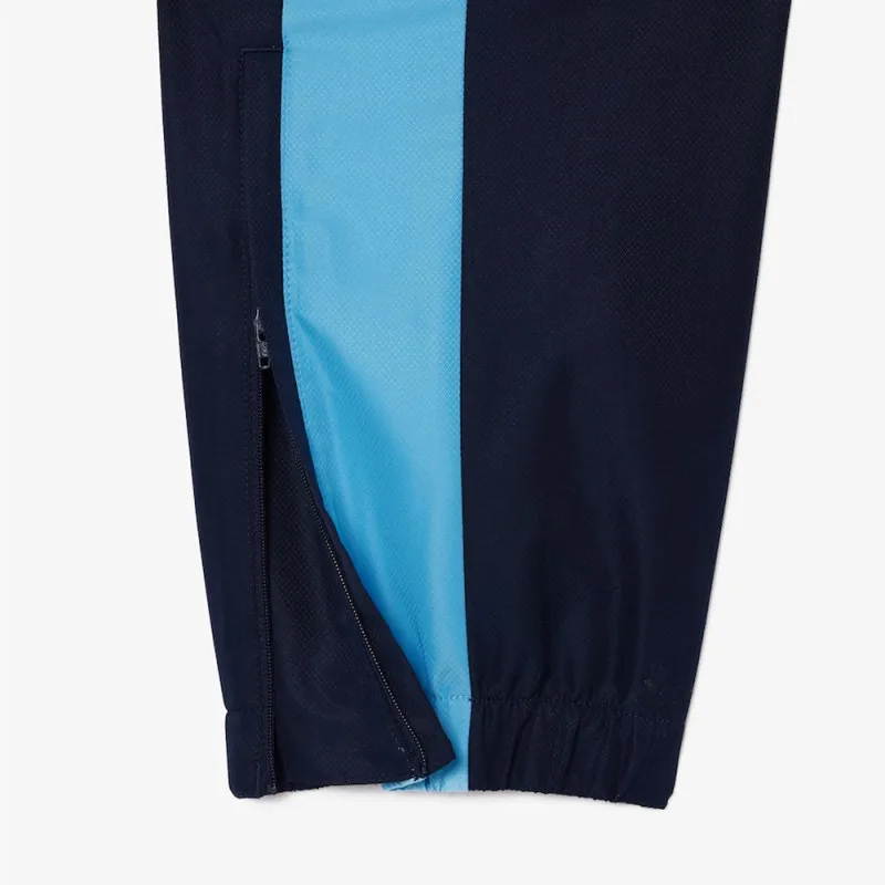 PANTALON DE SURVÊTEMENT LACOSTE TENNIS SPORTSUIT LÉGER BLEU MARINE