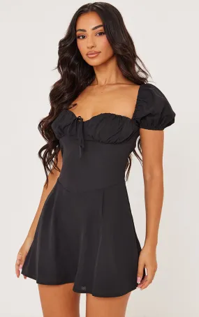 Petite Mini robe noire à manches courtes