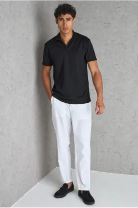 Polo basic noir texturé